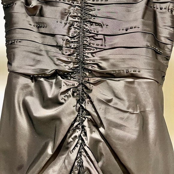 A long silky grey dress with a small long sleeve jacket. - Picture 2 of 5